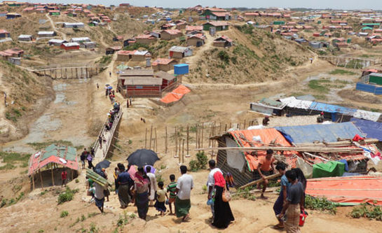 Eine neue Gruppe von Rohingya aus Myanmar kommt im Flüchtlingslager Kutupalong in Bangladesch an, wo bereits über 600 000 Menschen leben (Mai 2018). (Foto: Arifur Rahman/Goopy Bagha Productions/Caritas Schweiz)